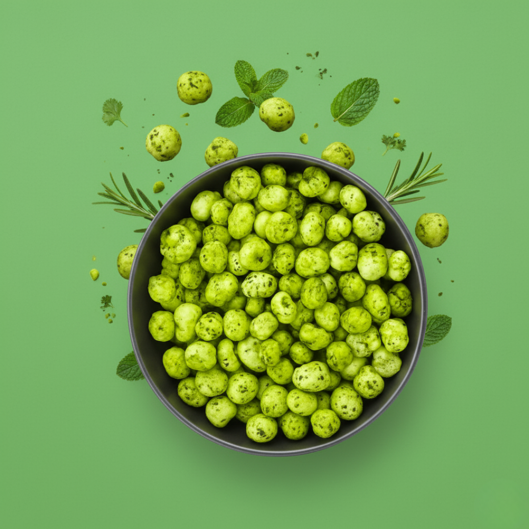 Product photoshoot of Mera Kisan Pudina Makhana with floating mint leaves and roasted foxnuts