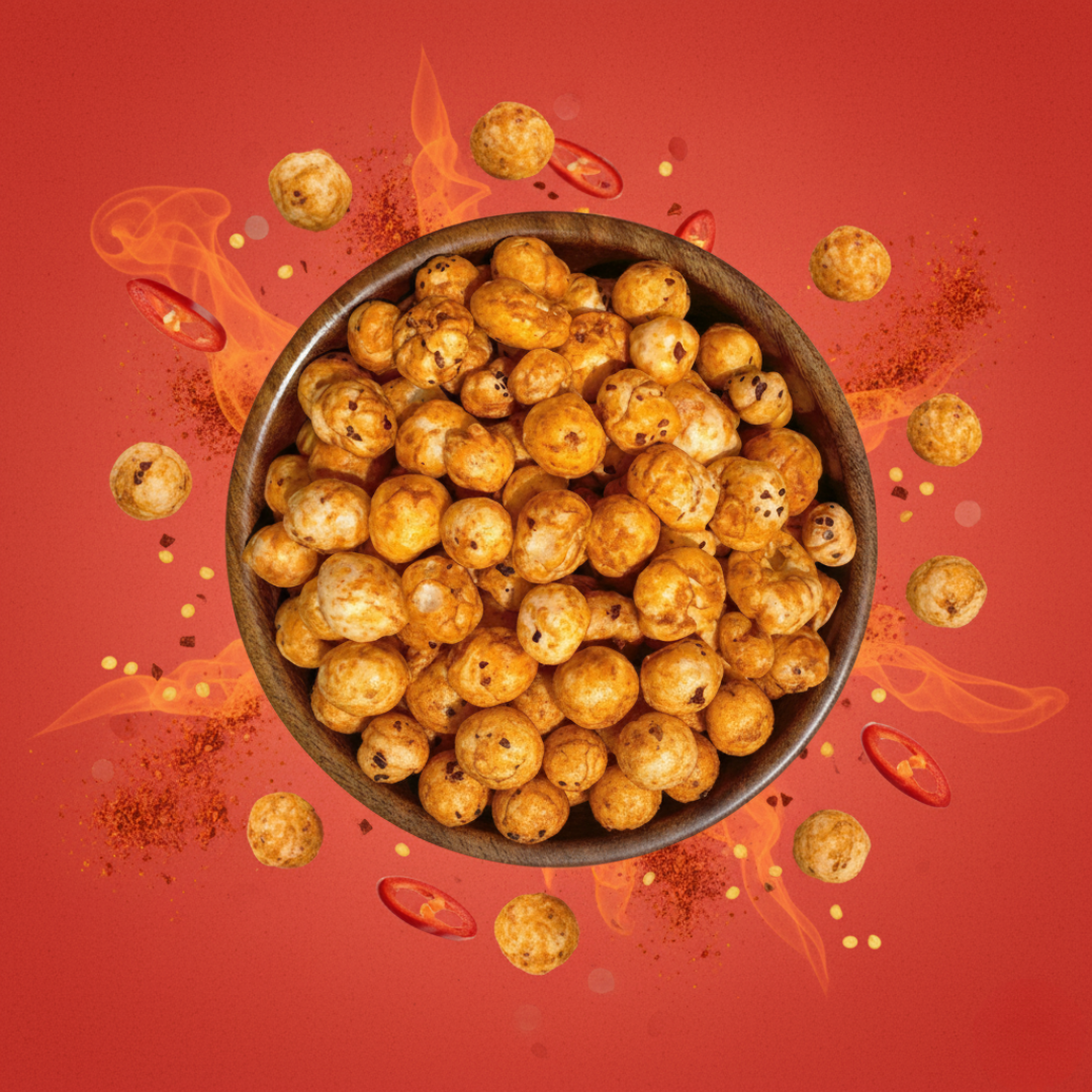 Fiery Peri-Peri Makhana product photo with floating chili and spice dust