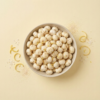Top view of salt and vinegar makhana arranged neatly on a light background, showing its fresh and zesty appearance