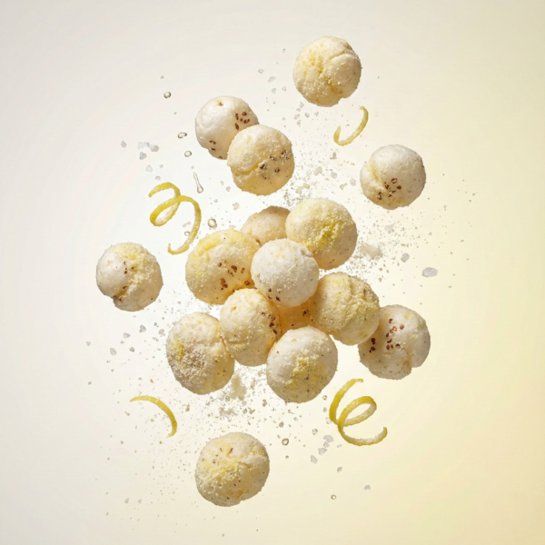 Floating salt and vinegar makhana showing its crisp texture and subtle tangy seasoning against a soft background