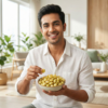 A person enjoying lemon chilli makhana as a light, tangy and spicy snack indoors