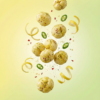 Floating lemon chilli makhana showing its crunchy texture with hints of citrus and chilli seasoning