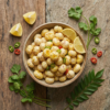 Top view of lemon chilli flavoured makhana in a bowl, highlighting the bright seasoning and crisp texture