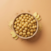A bowl of ginger flavoured makhana coated with warm spice seasoning, styled on a clean surface for a healthy snack look