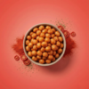 Top view of ketchup makhana arranged neatly on a warm-toned background, showing its tangy tomato appearance