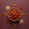 Top view of gochujang makhana arranged neatly on a warm red-toned background, showing its bold seasoning