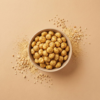 Top view of peanut butter makhana arranged neatly on a beige background, showing its smooth nutty seasoning