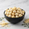 A bowl of white cheddar flavoured makhana coated with a creamy cheese seasoning, styled for a clean and premium snack look